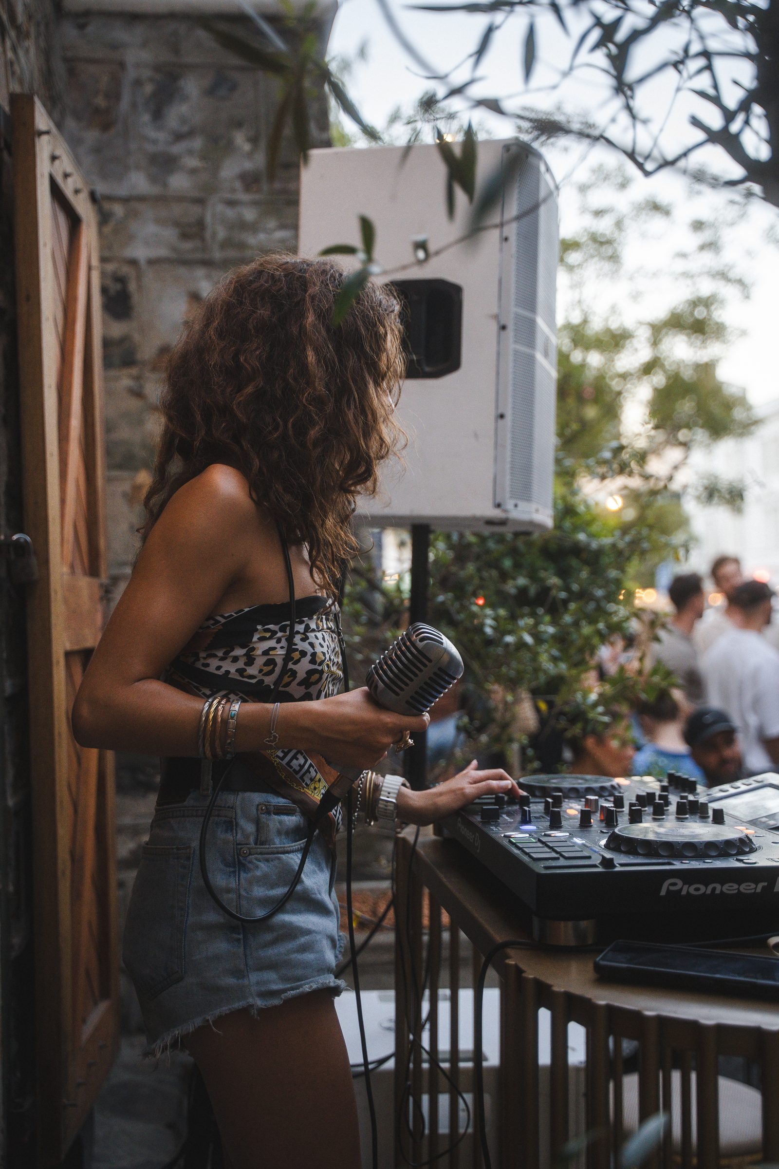 M!A LI'EL on the decks with a crowd behind her